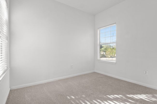 Unfurnished room with carpet flooring and baseboards | Image 15