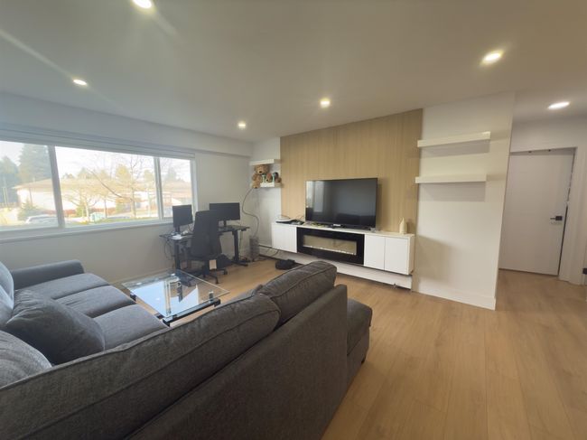Living room featuring recessed lighting, baseboards, and light wood-style floors | Image 5