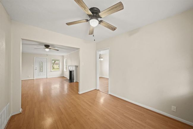 The dining room is perfectly incorporated with the living room. | Image 7