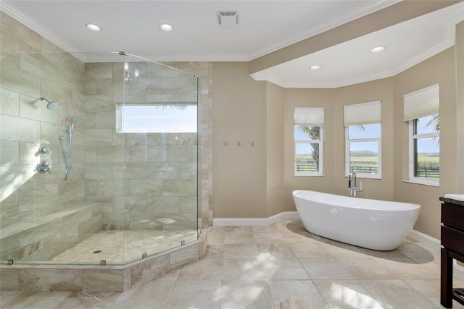Large shower and very inviting soaking tub | Image 49