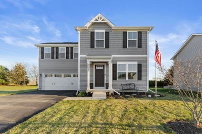 Lovely 2 story home with charming shutters and att | Image 1