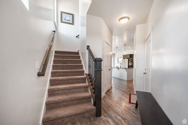 Staircase with wood finished floors | Image 5