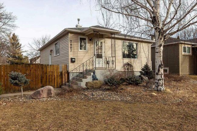 2003 9 Avenue S, Home with 3 bedrooms, 1 bathrooms and 4 parking in Lethbridge AB | Image 1