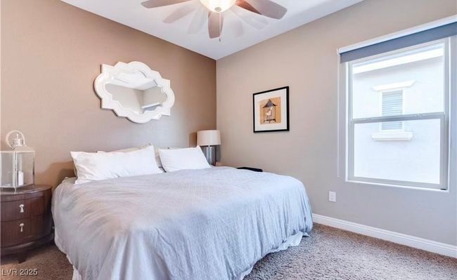 Carpeted bedroom featuring baseboards and ceiling fan | Image 13