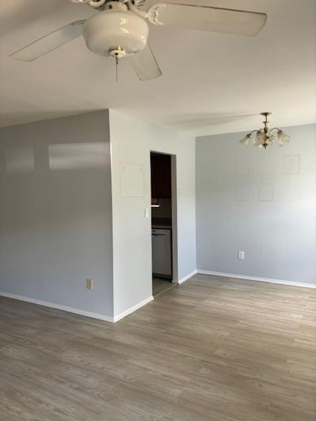 Dining room with vinyl plank floor | Image 8