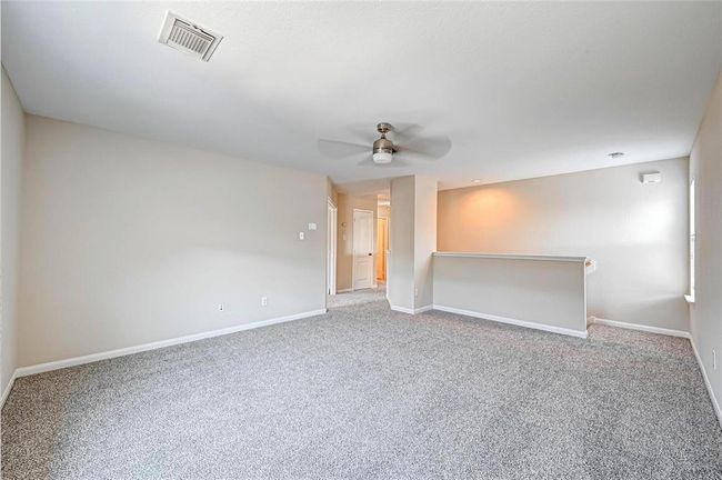 The large game room at the top of the stairs can be a great spot for movie night, or a large pool table. | Image 22