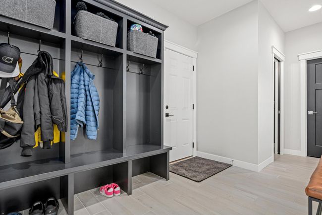 Built in lockers off the garage | Image 15