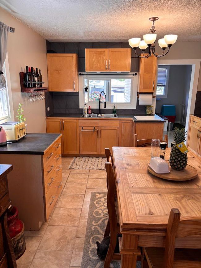 5223 3 St W, House other with 6 bedrooms, 2 bathrooms and 2 parking in Claresholm AB | Image 4