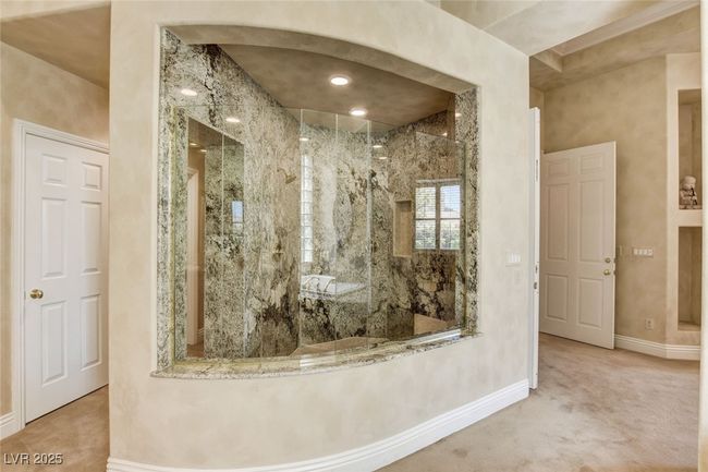 Bathroom with a walk in shower and baseboards | Image 31