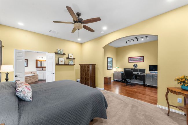 Primary bedroom with view of office area | Image 18