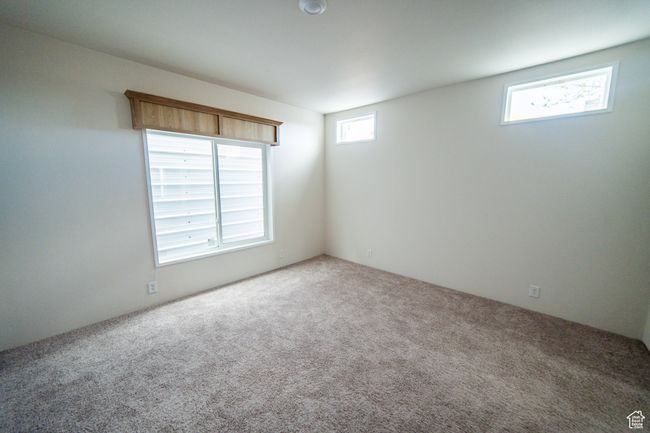Unfurnished room featuring carpet | Image 53