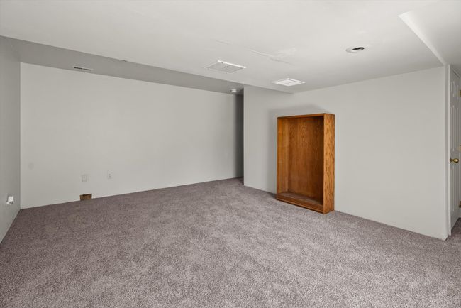 Spare room featuring carpet floors | Image 35