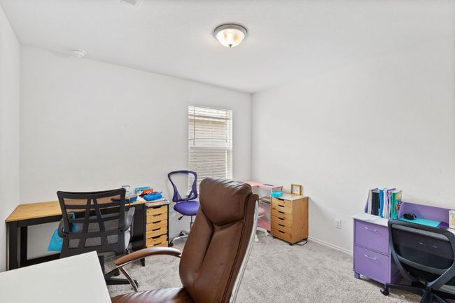 Office space with light carpet and baseboards | Image 22