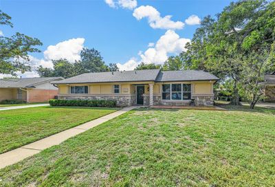 Ranch-style home with a front yard and a patio | Image 2