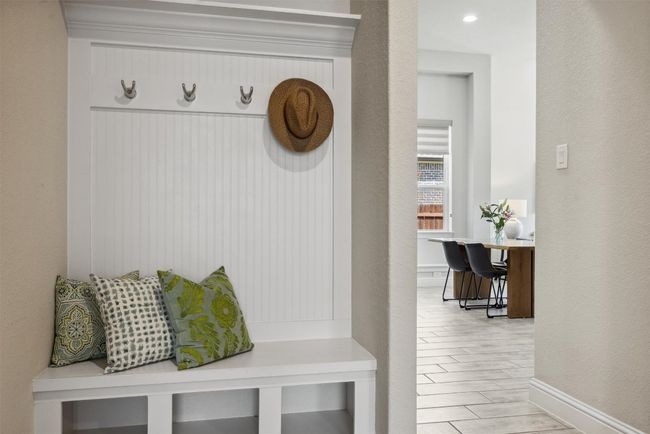 Mudroom featuring light wood finished floors and baseboards | Image 19