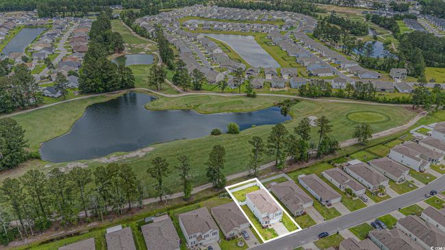 Aerial overview of property's location featuring nearby suburban area and a large body of water | Image 4
