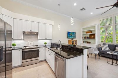 8599 Pepper Tree Way, House other with 3 bedrooms, 2 bathrooms and null parking in Naples FL | Image 2