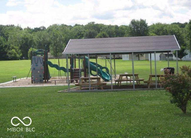 view of play area featuring a lawn | Image 4