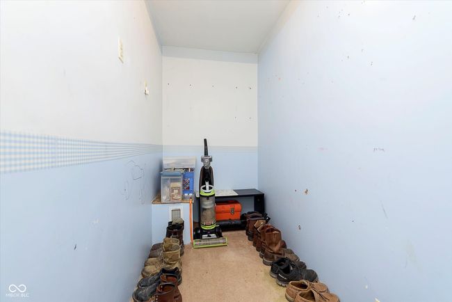 hall featuring carpet floors | Image 16