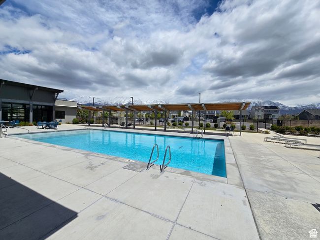 Community pool featuring a patio area | Image 22