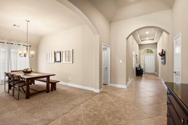 Formal dining room, perfect for entertaining. | Image 5
