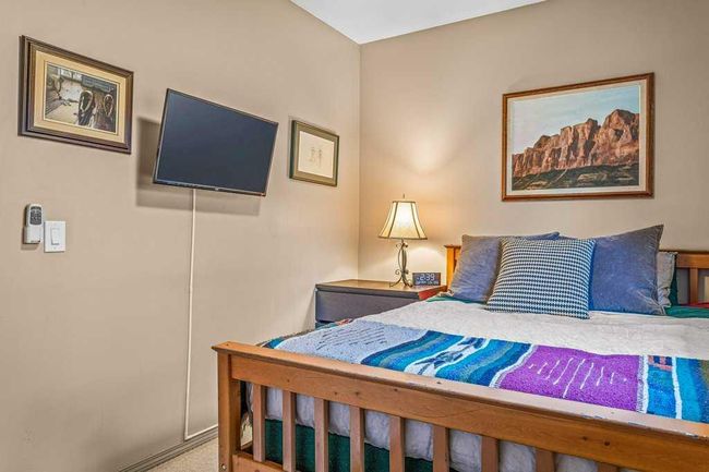 307 - 176 Kananaskis Way, Condo with 2 bedrooms, 1 bathrooms and 2 parking in Canmore AB | Image 24