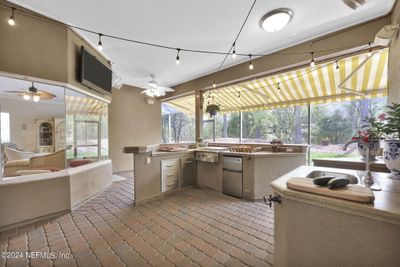 Outdoor Summer Kitchen with Misting Blowers for year round comfort. | Image 1