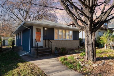 Nestled on a tree-lined street in a charming Robbinsdale neighborhood, this inviting one-story home boasts character and comfort at every turn. | Image 1