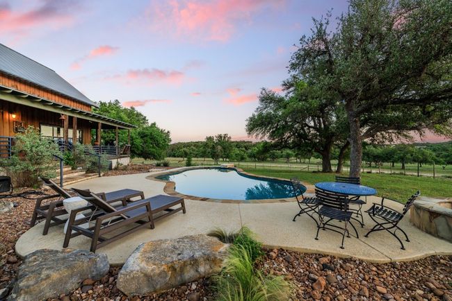 Outdoor pool with a patio area | Image 12