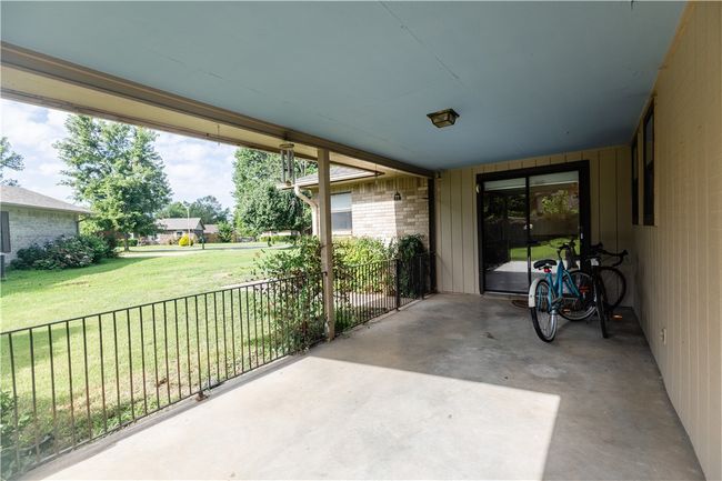 covered patio with entrance from dining as well as master bedroom | Image 39