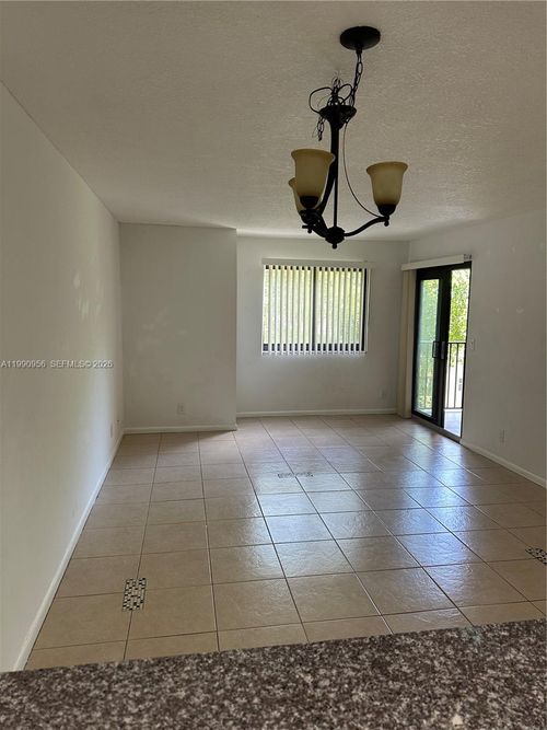 215-10001 W Atlantic Blvd, Coral Springs, FL, 33071-6560 | Card Image