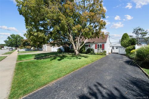 166 Swan Ln, Levittown, NY, 11756-4438 | Card Image