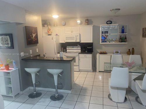 4-7-15669 Sw 73rd Circle Ter, Miami, FL, 33193-1810 | Card Image