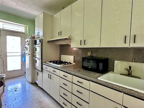 64 Metropolitan Ave, Middle Village, NY, 11379-1627 | Card Image