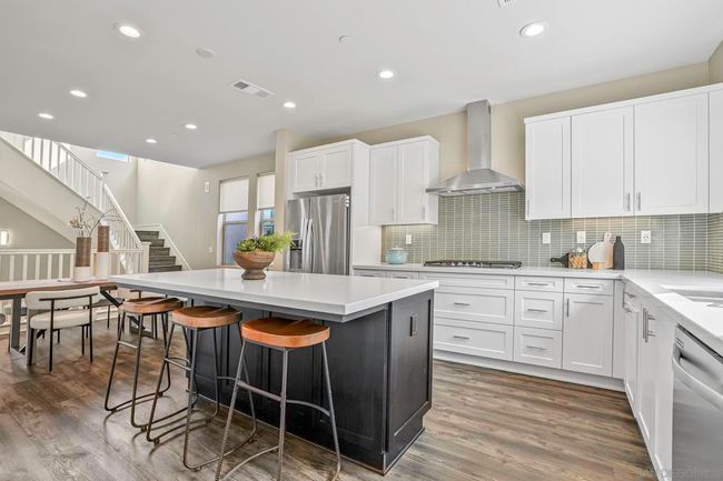 Spacious island in kitchen is great for a kick snack or an informal meal | Image 14