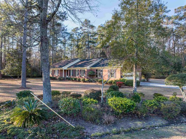 View of front of house featuring a garage | Image 4