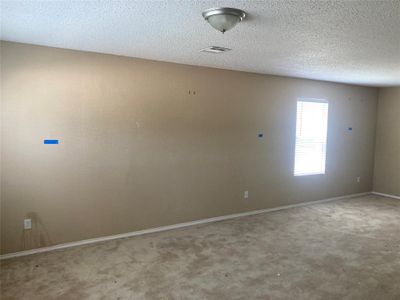 Carpeted spare room with a textured ceiling | Image 3