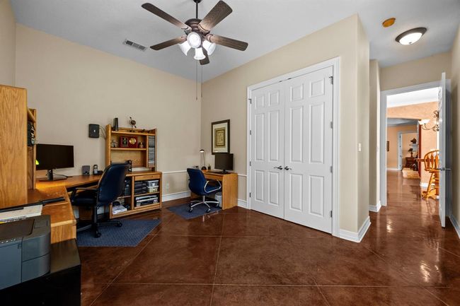 Flexible room to use as an office or second en-suite offers plentiful storage and seamless flow back to the main living areas. | Image 8