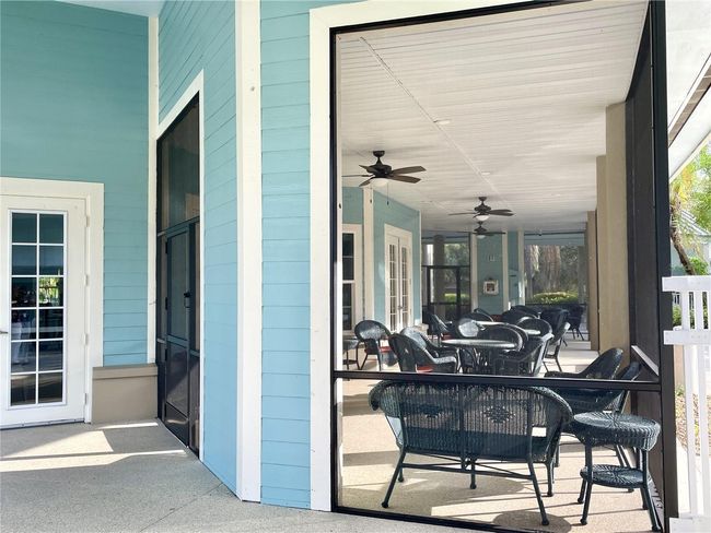 Screened clubhouse patio | Image 58