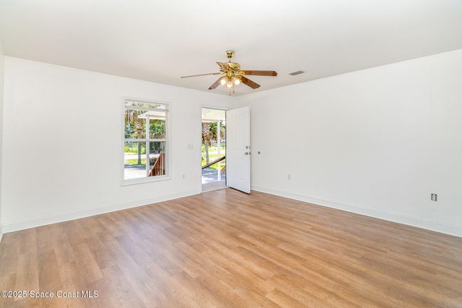 Second unit #1230. Spacious living room area with plenty of natural light | Image 14