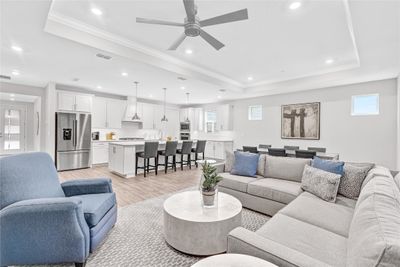 OPEN LIVING AREA WITH TRAY CEILING | Image 2