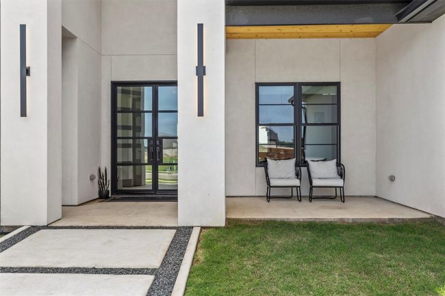 Property entrance featuring stucco siding | Image 5