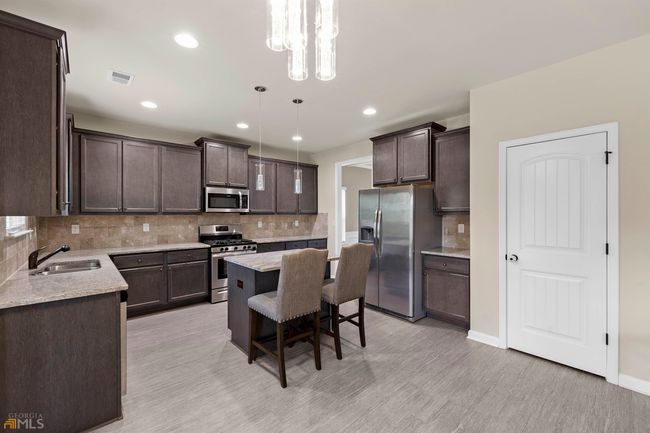 3015 Button Cir, House other with 4 bedrooms, 3 bathrooms and null parking in Loganville GA | Image 20