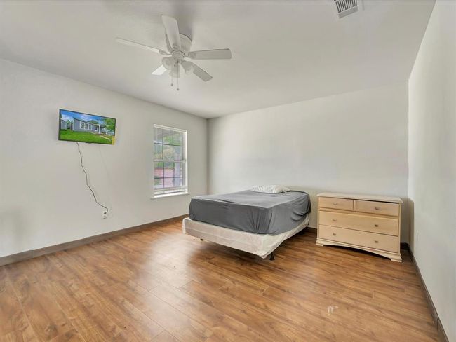 Primary bedroom with it's own bathroom | Image 24
