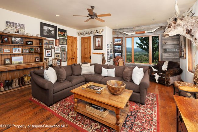 Designed to be a writer's oasis, surrounded in books, boots and hard-wood floors, this space provides inspiration, refuge and an environment for creativity and productivity. | Image 15