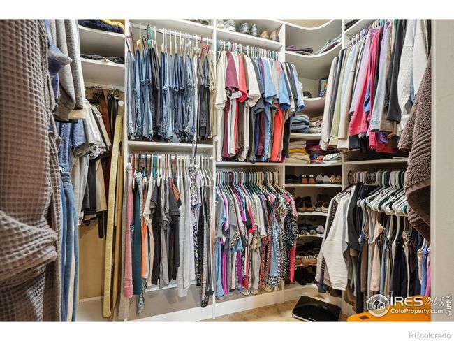 Custom closet on the main floor primary bedroom | Image 16