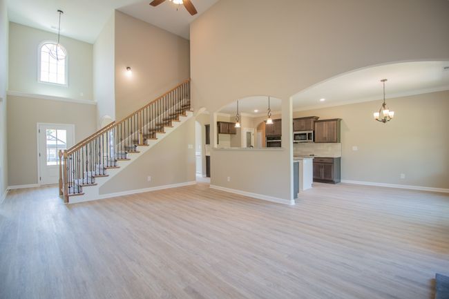 Open Layout Downstairs and SPC Flooring Throughout the Foyer, Living Room, Kitchen, Eat-In Area and Formal Dining Room! | Image 6