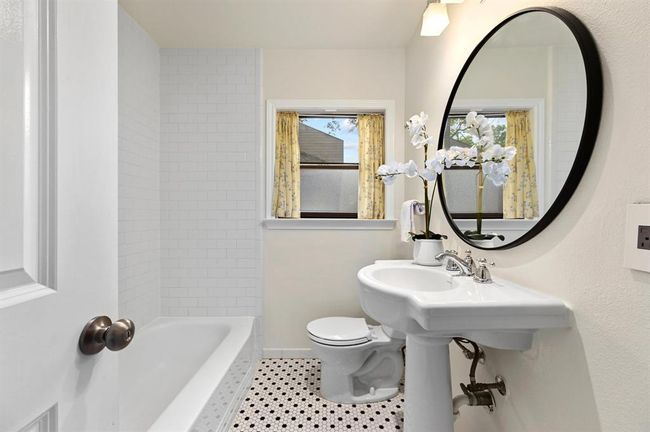Full bath featuring toilet and tile patterned floors | Image 14