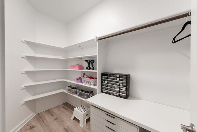 Spacious closet/pantry with light wood-style floors | Image 27