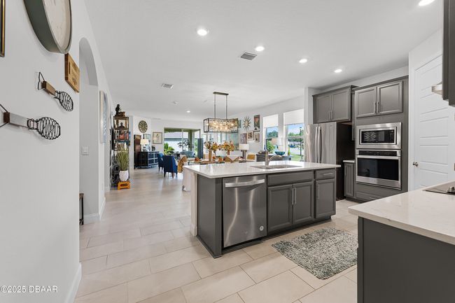 Lots of Light throughout Kitchen, Dining and Living Rooms | Image 8